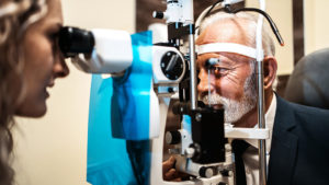 Senior man gets his vision checked - 2022 Changes to California’s Medi-Cal